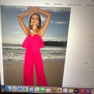 Women pink strapless jumpsuit.